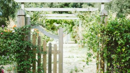 Creating character with gates and arches at the entrance to your plot