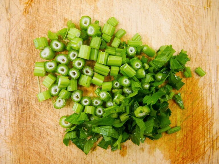 Chopped fresh chives cutting board knife