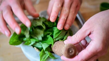 Pinching and deadheading for bushier herbs and longer-lasting flowers