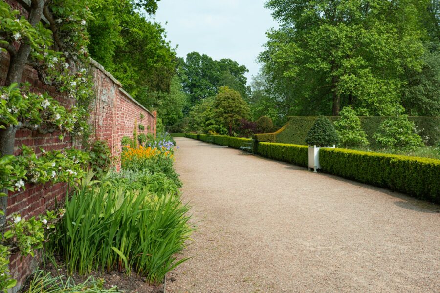 Planting turn plain driveway into welcoming garden approach