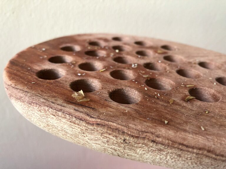 Container garden drainage holes closeup