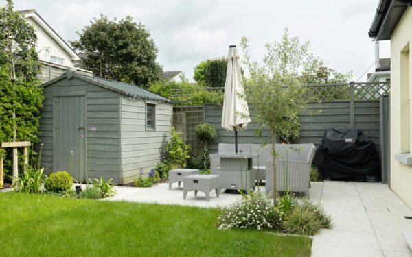 Backyard garden rooms that turn a plain yard into a layered landscape